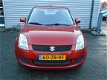 Suzuki Swift - 1.3 Comfort Cool - 1 - Thumbnail