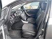 Opel Astra Sports Tourer - 1.6 Turbo 180 pk Cosmo Automaat Navigatie / Schuifdak / Xenon / Half leer - 1 - Thumbnail