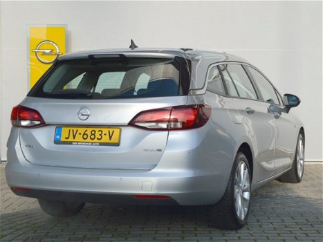 Opel Astra Sports Tourer - 105 pk Edition Navigatie / Climate control / Schuif-kantel dak / Apple Ca - 1