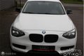 BMW 1-serie - 114i Business Urban Line / 75D KM / HOOGGLANS ACCENTEN / ENZ - 1 - Thumbnail