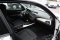 BMW 1-serie - 114i Business Urban Line / 75D KM / HOOGGLANS ACCENTEN / ENZ - 1 - Thumbnail