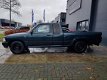 Toyota HiLux - 2.4 Xtra Cab 1e Eigenaar Grijs kenteken - 1 - Thumbnail