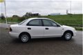 Mazda 323 - 1.5i LX SEDAN ELEKTRISCH PAKKET TREKHAAK NIEUWE APK - 1 - Thumbnail