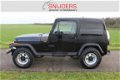 Jeep Wrangler - 2.5i Softtop Nette staat - 1 - Thumbnail