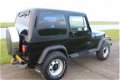 Jeep Wrangler - 2.5i Softtop Nette staat - 1 - Thumbnail