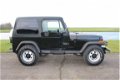 Jeep Wrangler - 2.5i Softtop Nette staat - 1 - Thumbnail
