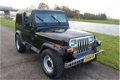 Jeep Wrangler - 2.5i Softtop Nette staat - 1 - Thumbnail