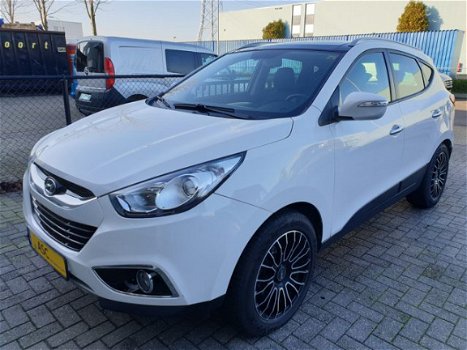 Hyundai ix35 - 2.0i 4WD i-Catcher (Automaat) Clima Volleder Navigatie Camera Panoramadak - 1