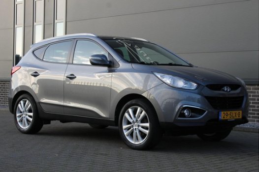 Hyundai ix35 - 2.0i i-Catcher / 163 PK / Trekhaak / Navigatie / Achteruitrijcamera / Panoramadak - 1