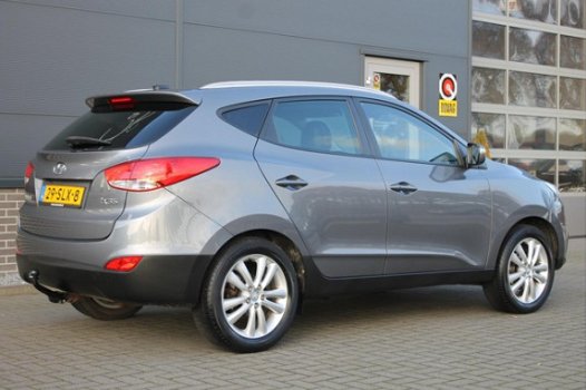 Hyundai ix35 - 2.0i i-Catcher / 163 PK / Trekhaak / Navigatie / Achteruitrijcamera / Panoramadak - 1