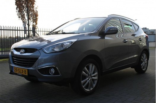 Hyundai ix35 - 2.0i i-Catcher / 163 PK / Trekhaak / Navigatie / Achteruitrijcamera / Panoramadak - 1