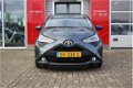 Toyota Aygo - 1.0 VVT-i x-first met elektrisch vouwdak en sub woofer - 1 - Thumbnail