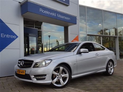 Mercedes-Benz C-klasse Coupé - C180 157PK AUTOMAAT AMBITION EDITION-C | NAVI | XENON | LEDER-ALCANTA - 1