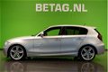 BMW 1-serie - 118i 143pk 5drs Business Line Sport | M Pakket | Cruise Control | Navigatie 118i 143pk - 1 - Thumbnail