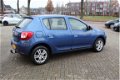 Dacia Sandero - 0.9 TCE LAURÉATE 1E EIG NAVI AIRCO CRUISE TREKHAAK - 1 - Thumbnail