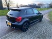 Volkswagen Polo - 1.4 TSI GTI / DSG / 5 drs / Navi / Cruise control / Clima / Sport / 180pk - 1 - Thumbnail