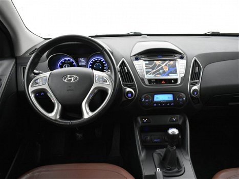 Hyundai ix35 - 2.0i 164 PK 4WD i-CATCHER + PANORAMA / LEDER / NAVIGATIE / TREKHAAK - 1