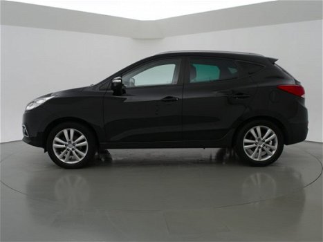 Hyundai ix35 - 2.0i 164 PK 4WD i-CATCHER + PANORAMA / LEDER / NAVIGATIE / TREKHAAK - 1