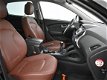 Hyundai ix35 - 2.0i 164 PK 4WD i-CATCHER + PANORAMA / LEDER / NAVIGATIE / TREKHAAK - 1 - Thumbnail