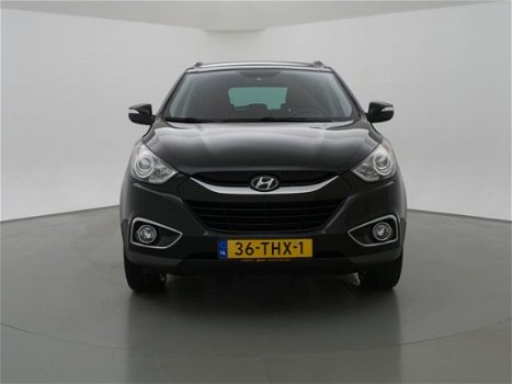 Hyundai ix35 - 2.0i 164 PK 4WD i-CATCHER + PANORAMA / LEDER / NAVIGATIE / TREKHAAK - 1