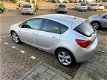 Opel Astra - 1.4 Turbo Edition Autom/140pk/Airco/17inch - 1 - Thumbnail