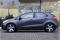 Kia Rio - 1.2 CVVT Comfort Pack, Trekhaak, Airco, AUX/USB - 1 - Thumbnail