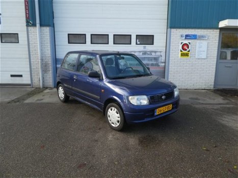 Daihatsu Cuore - 1.0-12V DVVT STi - 1