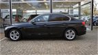 BMW 3-serie - 320i Efficient Dynamics Edition | Sport Edition | Xenon | Leer | Navigatie | Achterban - 1 - Thumbnail