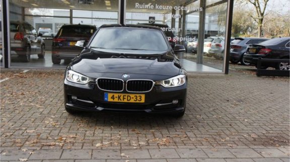 BMW 3-serie - 320i Efficient Dynamics Edition | Sport Edition | Xenon | Leer | Navigatie | Achterban - 1