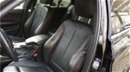 BMW 3-serie - 320i Efficient Dynamics Edition | Sport Edition | Xenon | Leer | Navigatie | Achterban - 1 - Thumbnail