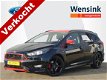 Ford Focus Wagon - Black Edition 1.5 150 PK | 1500 KG TREKGEWICHT | Trekhaak | Navigatie | Cruise co - 1 - Thumbnail