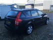 Kia Cee'd Sporty Wagon - 1.6 X-tra (Airco, cruise) - 1 - Thumbnail