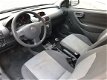 Opel Corsa - 1.0-12V Rhythm Cruise Control ABS - 1 - Thumbnail