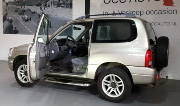 Suzuki Grand Vitara - 1.6 Metal Top 4X4 aanbieding nu €3495, - 1