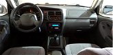 Suzuki Grand Vitara - 1.6 Metal Top 4X4 aanbieding nu €3495, - 1 - Thumbnail