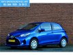 Toyota Yaris - 1.3 VVT-i 100pk AUTOMAAT ASPIRATION / AIRCO / CRUISE / A-CAMERA / LED-DRL / BLUETOOTH - 1 - Thumbnail