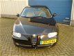 Alfa Romeo 147 - 1.6 T.Spark Distinctive - 1 - Thumbnail