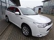 Mitsubishi Outlander - 2.0 PHEV Executive Edition *PRIJS IS INCL. BTW *4WD *NAVIGATIE *CRUISE CONTRO - 1 - Thumbnail