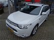 Mitsubishi Outlander - 2.0 PHEV Executive Edition *PRIJS IS INCL. BTW *4WD *NAVIGATIE *CRUISE CONTRO - 1 - Thumbnail