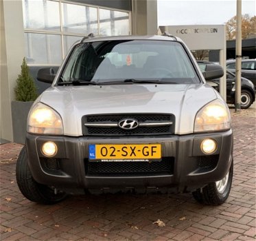 Hyundai Tucson - 2.0i Active airco, radio cd-speler, elektrische ramen, mistlampen voor - 1