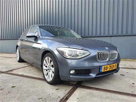 BMW 1-serie - 118i Leder Xenon Navi Professional VOL December aanbieding bij geen inruil 12450 - 1