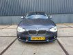 BMW 1-serie - 118i Leder Xenon Navi Professional VOL December aanbieding bij geen inruil 12450 - 1 - Thumbnail