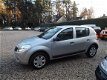 Dacia Sandero - 1.2 Aniversare met trekhaak zeer nette auto - 1 - Thumbnail