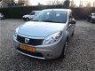 Dacia Sandero - 1.2 Aniversare met trekhaak zeer nette auto - 1 - Thumbnail