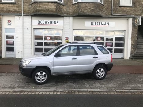 Kia Sportage - 2.0 CVVT X-ecutive - 1