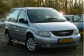 Chrysler Grand Voyager - 2.4i SE Luxe AUT 7P NAP/AIRCO/1JR APK - 1 - Thumbnail