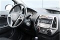 Hyundai i20 - 1.2i i-Motion 5drs | 1e Eig. | Unieke km-stand | Airco | LED | El. bed. ramen | - 1 - Thumbnail
