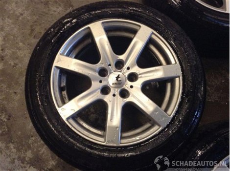 Opel Astra - H velgen compleet + 4x banden - nette set Zien is kopen - 1