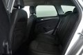 Opel Astra Sports Tourer - 1.7 CDTi Business + NAVI / AIRCO / PDC / HALFLEER / CRUISE / LMV / 6BAK - 1 - Thumbnail