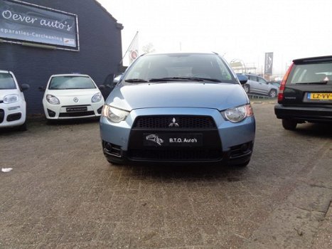 Mitsubishi Colt - 1.3 INVITE / AIRCO / CRUISE CONTROL / LM VLG / C.VERGR.AFSTANDBEDIEND / ELEK RAMEN - 1